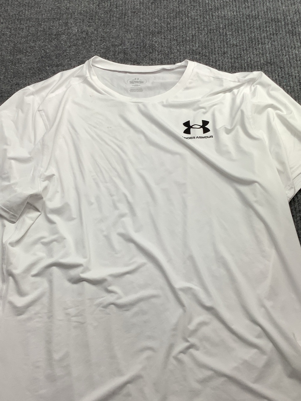 Under Armour Men’s White Short Sleeve Performance Tee with Black Logo